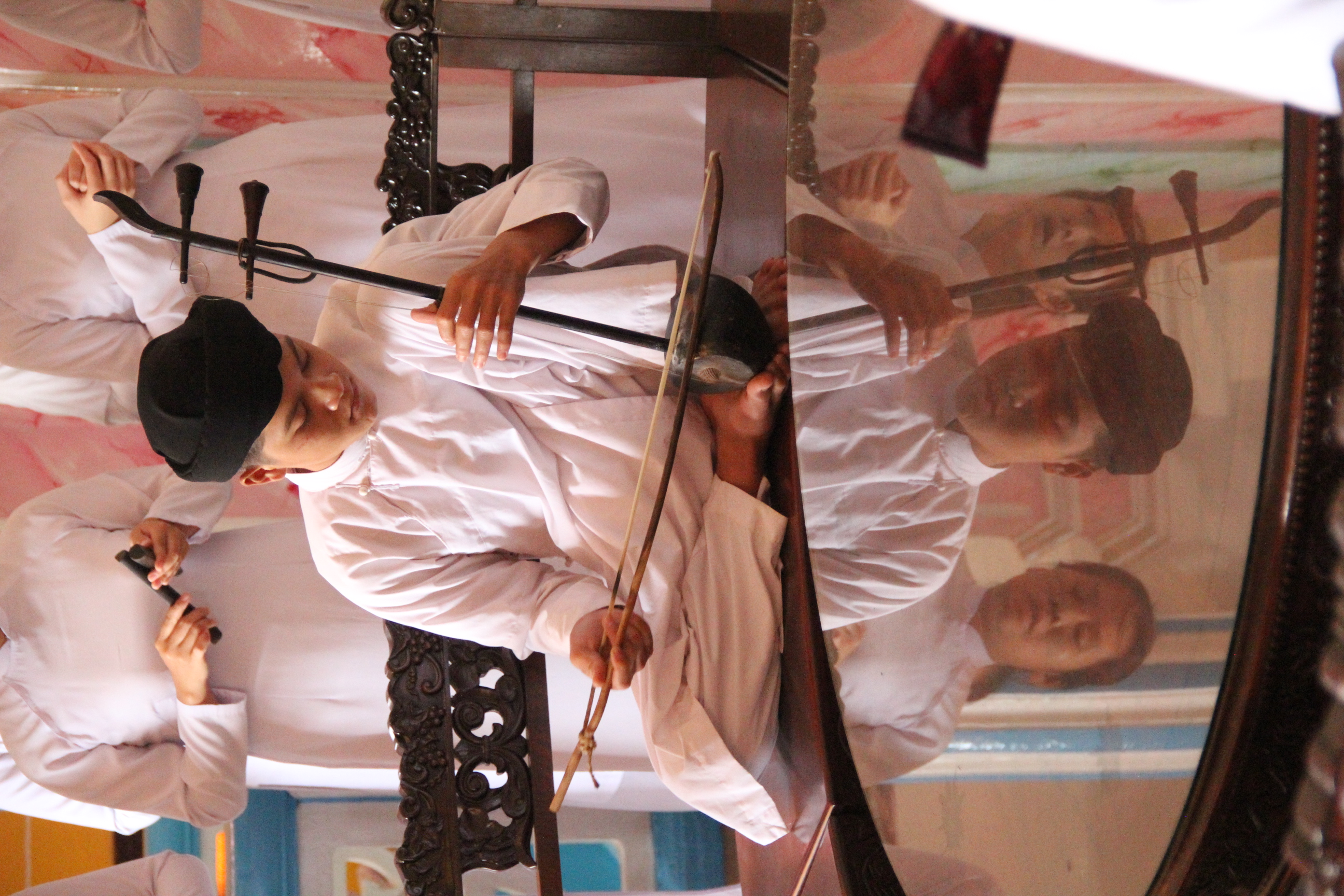 Followers singing Cao Dai hymns Followers singing Cao Dai hymns